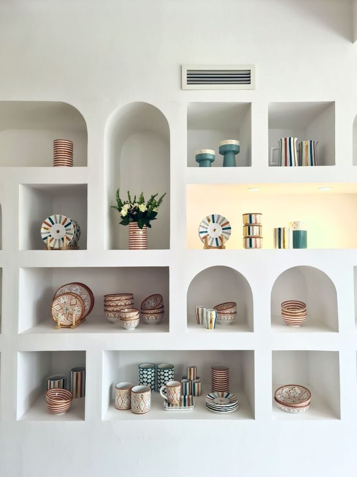 Floating Cement Almari Design with Open Shelves