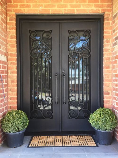 Traditional Iron Single Door Design with a Modern Twist