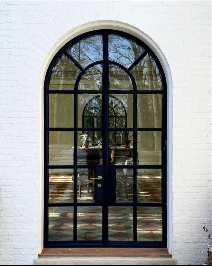  Glass and Metal Arch Door Design